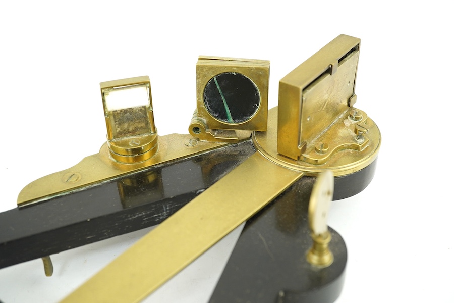 A Victorian brass mounted ebony octant with ivory scale, 36cm. Condition - poor, glass filter cracked and other minor damage overall. Ivory submission reference THSXLF51